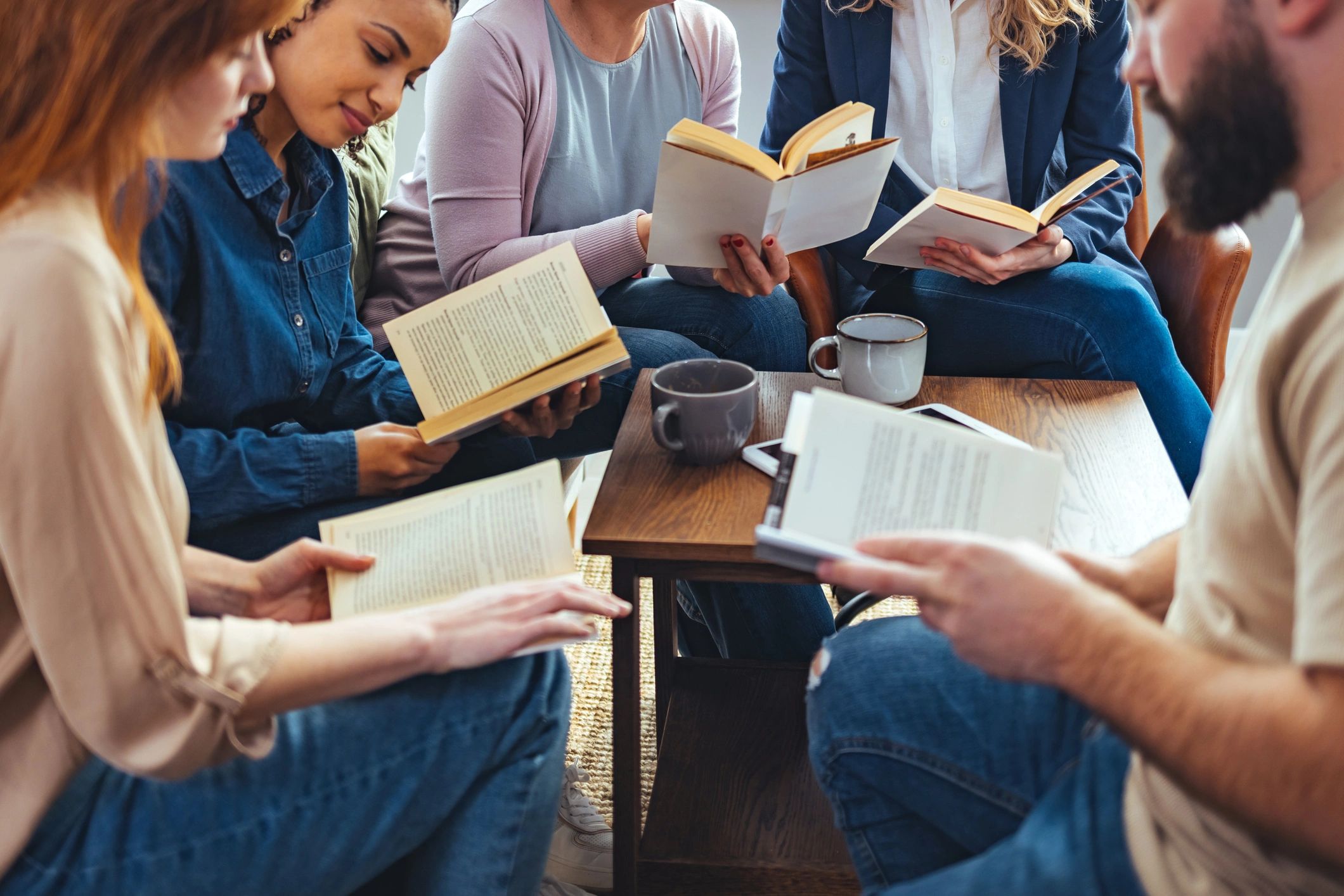 People reading and discussing Scripture together