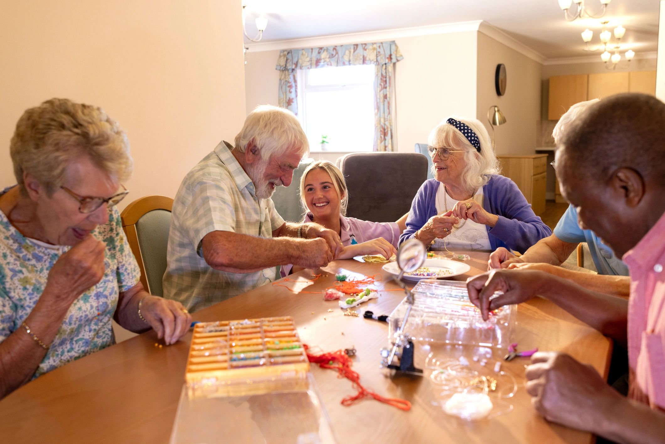 Group gathered around a table for a study discussion